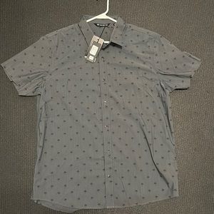 Brand new never worn Travis Mathew XL button down short sleeve shirt